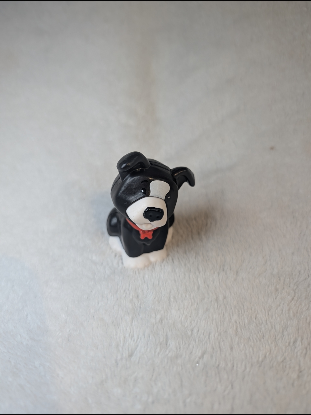 Fisher-Price Little People Black and White Puppy Toy with Red Bow